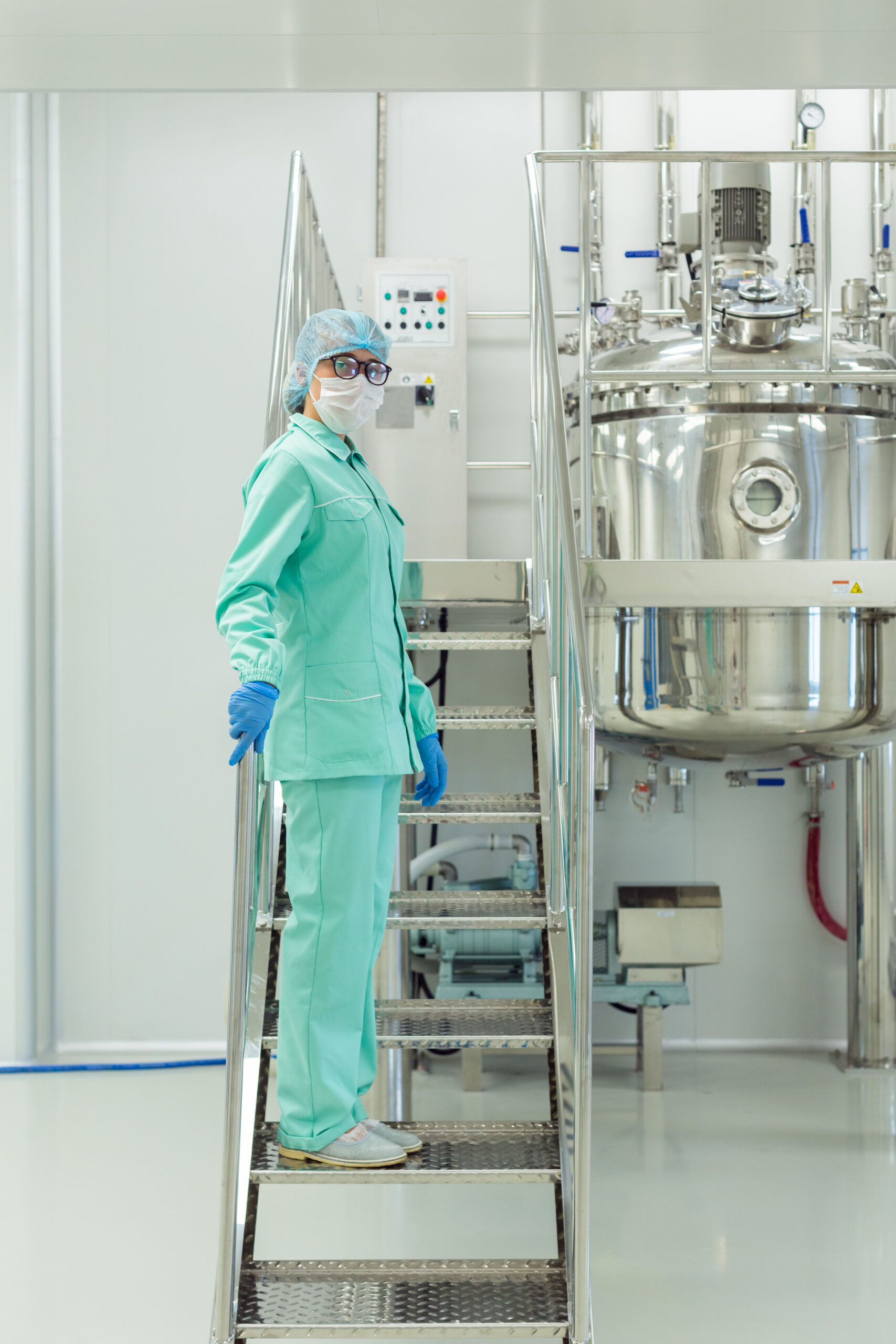 the operator controls the machine in the factory work